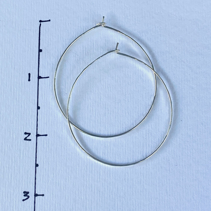 Delicate Silver Hoop Earrings in Multiple Sizes