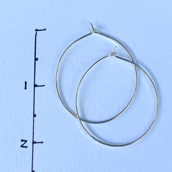 Delicate Silver Hoop Earrings in Multiple Sizes